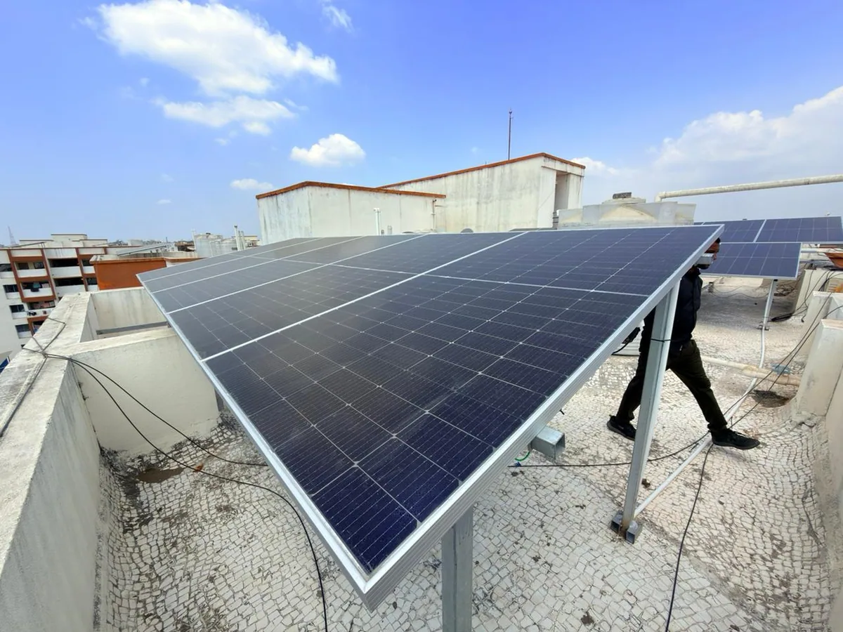 Solar installation work being carried out on an operational industrial site