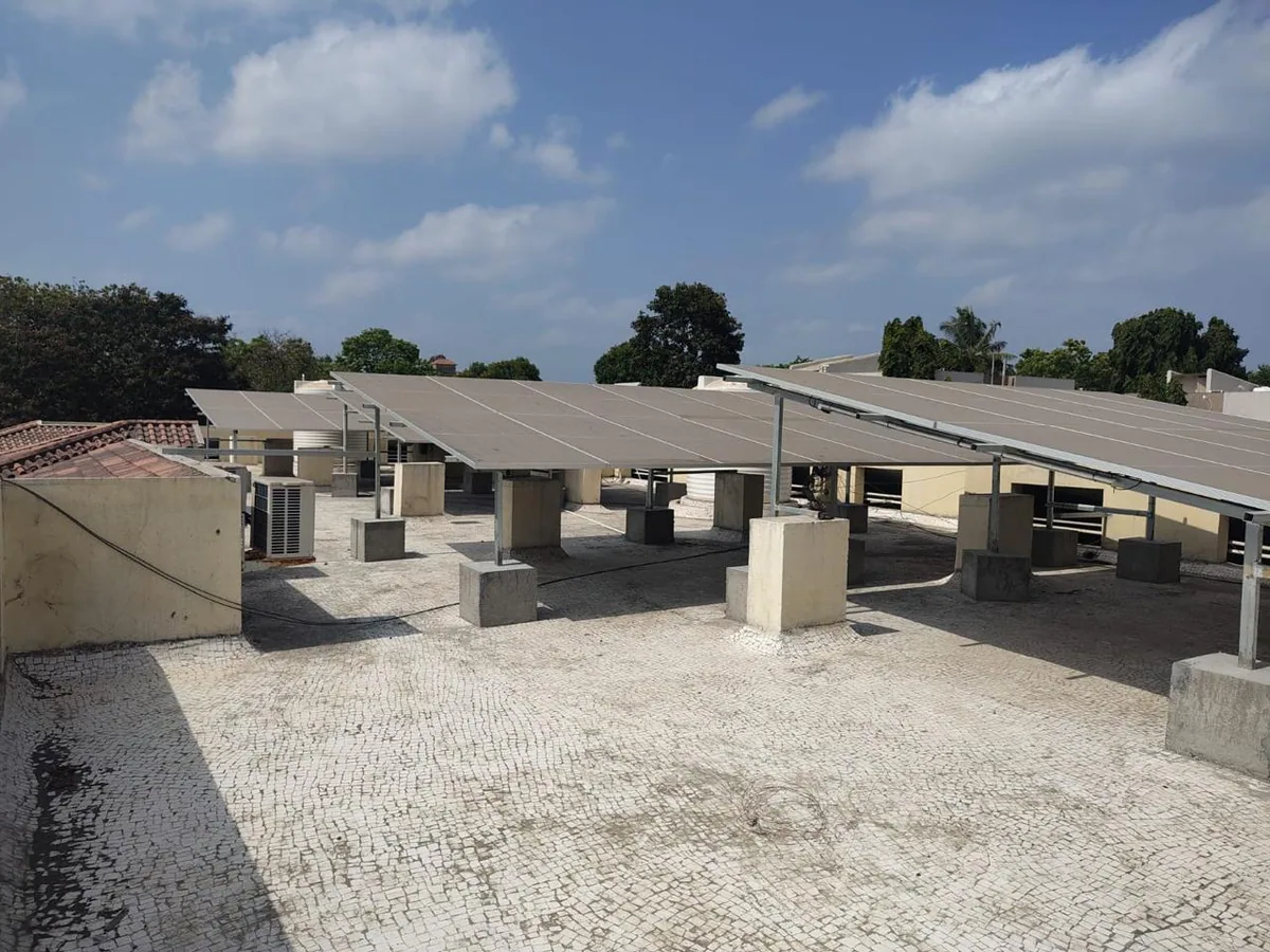 Wide rooftop solar installation across an institutional building